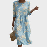 Cátia - Midi-Kleid mit Pflanzen- und Blumenmuster